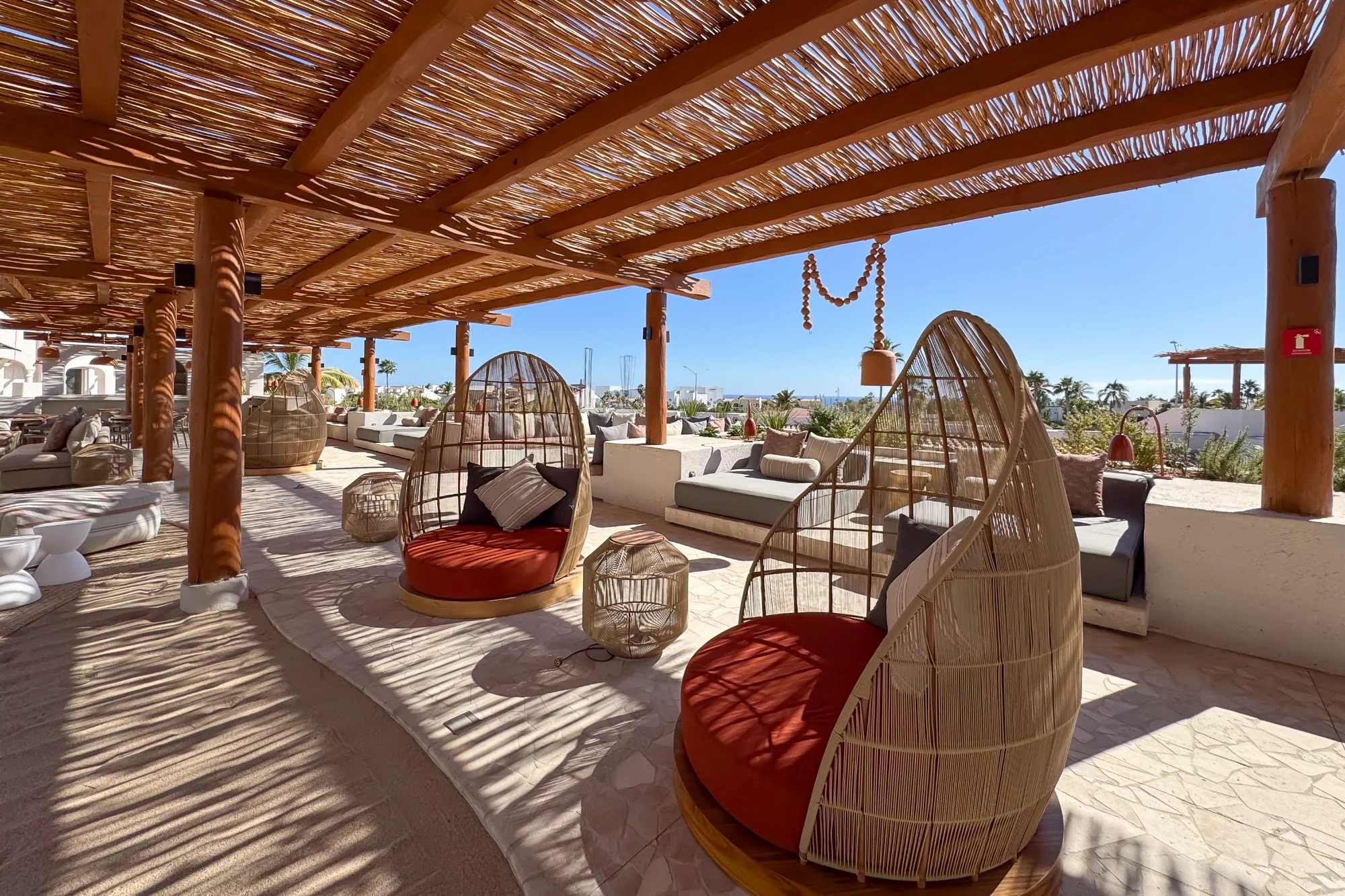 Rooftop lounge with palapa at Casa Nima
